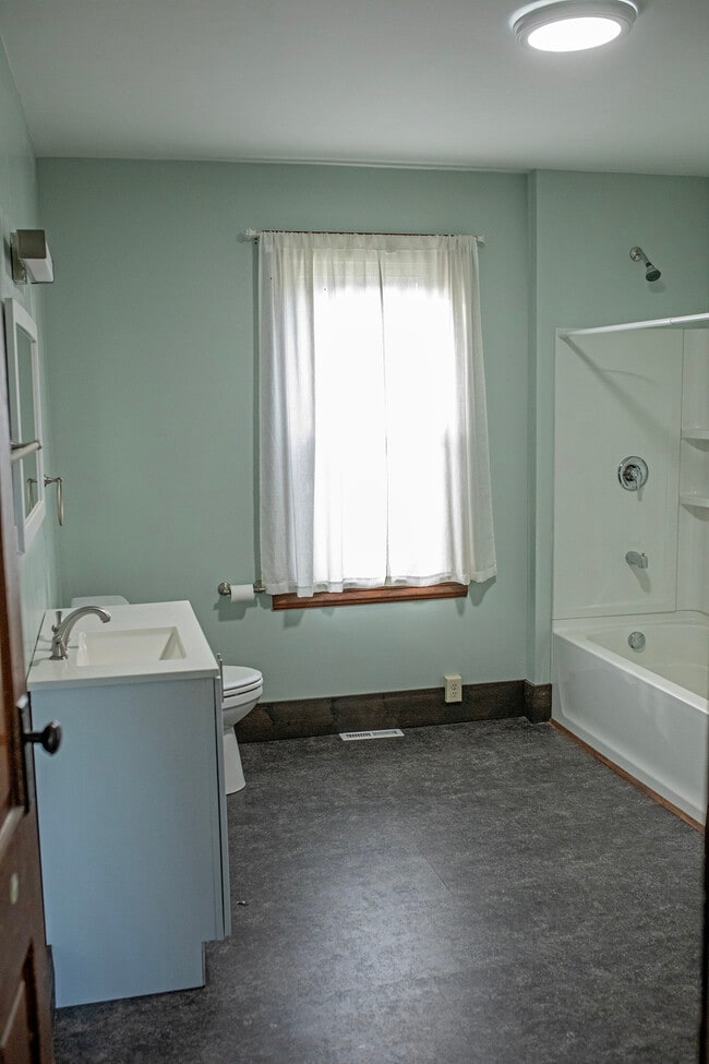 First floor bathroom & Laundry room - 4022 E Newport Rd
