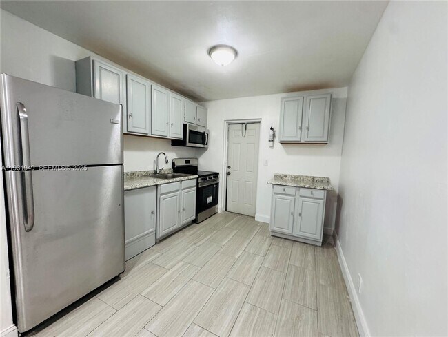 Building Photo - 631 NW 11th Ave