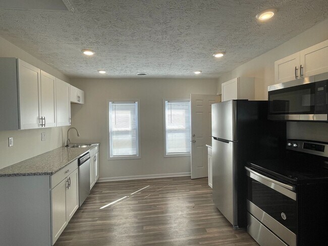 Building Photo - 1239 W 67th St