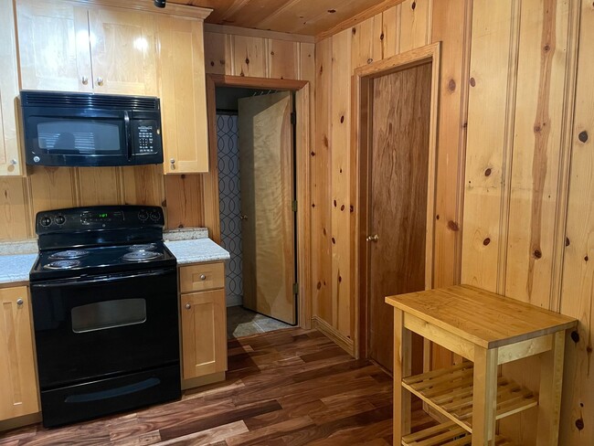 Building Photo - Upgraded and Cozy Al Tahoe Cabin - long te...