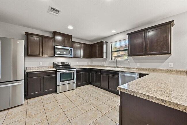 Building Photo - 9016 Stambourne St