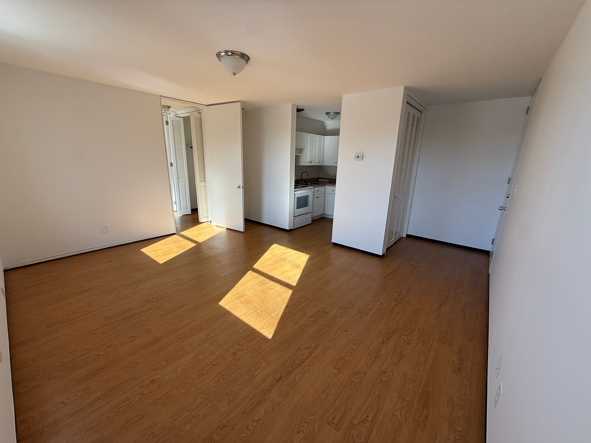 View of living room, entry, and kitchen - 528 Wade Ave