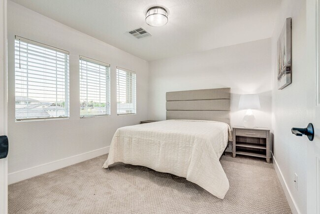 Building Photo - FULLY FURNISHED! Exudes sophistication with designer touches throughout