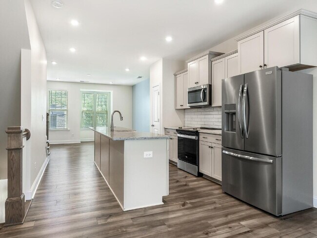 Building Photo - The Towns on Greenway! Two bedrooms. Two private baths, Half Bath. Greenway around the corner. Up...