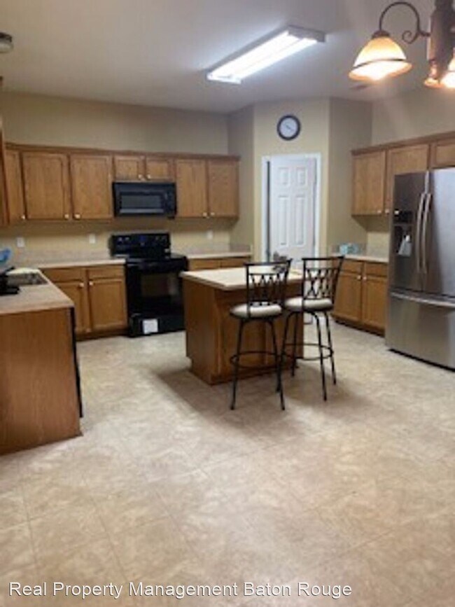 Building Photo - 4 br, 3 bath House - 10043 High Pines Dr.