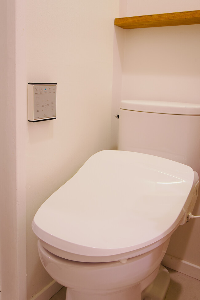 Toto toilet with an automated bidet - 4907 O Sullivan Dr