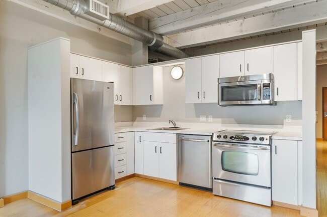 Building Photo - Historic Chown Pella Lofts - east facing studio w/parking/most utilities/rooftop deck