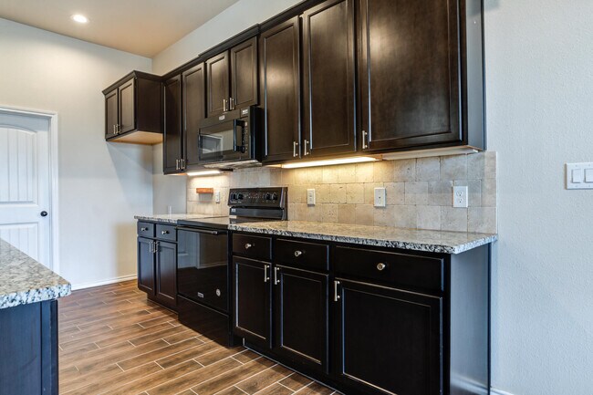 Building Photo - 13811 Uvalde Ave