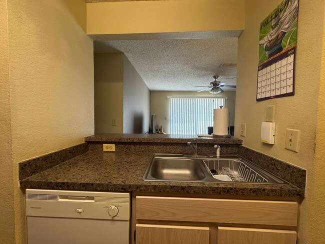 Building Photo - Modern 2-Bed/2-Bath Condo in Gated Communi...