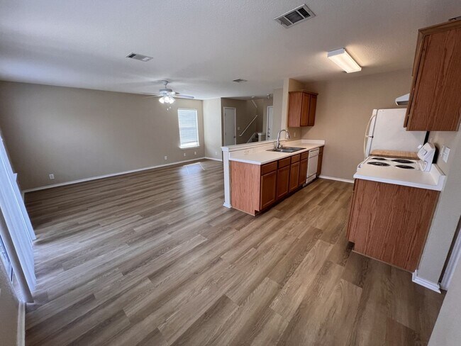 Building Photo - Generous Outdoor Space & Lawn Care Included!