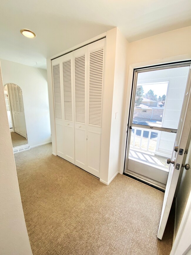 Master Bedroom Walk-in Closet and Balcony Door - 3268 S Oneida Way