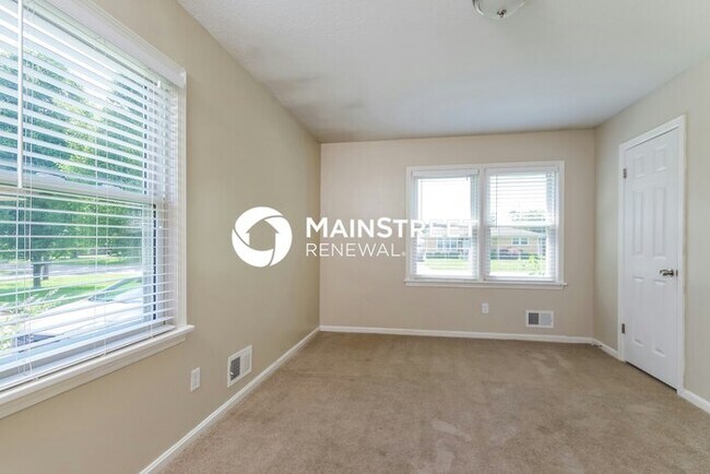 Building Photo - 8003 Canna Dr