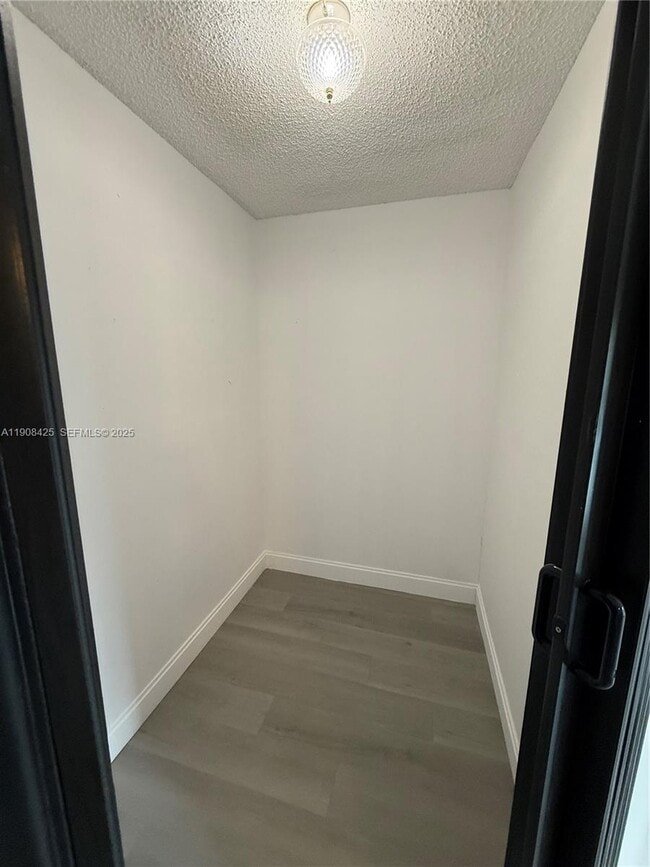 Building Photo - 9986 Royal Palm Blvd