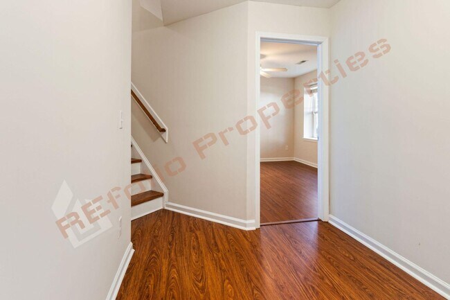 Building Photo - Luxury 3-Story Townhome, No Carpet 4 Bedro...