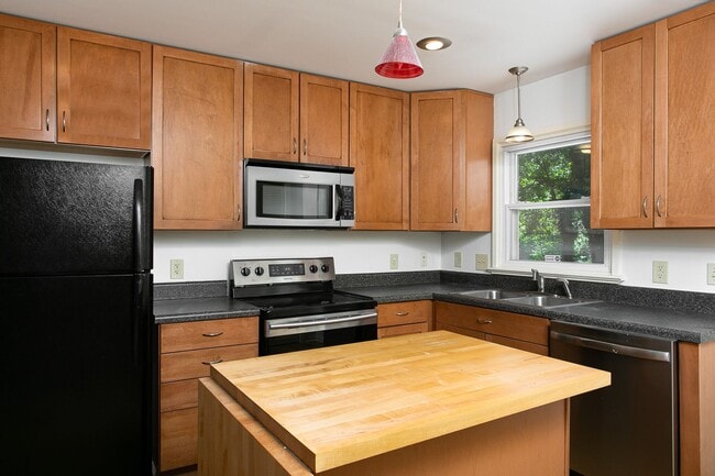 Building Photo - Spacious 1 Bedroom Duplex close to UNC Campus - Updated, Pet Friendly, Private Wooded Lot!