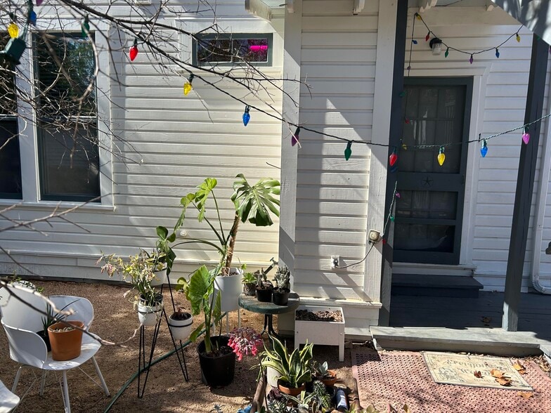 Garden area for Apt 1 at entry in backyard - 704 E Guenther St
