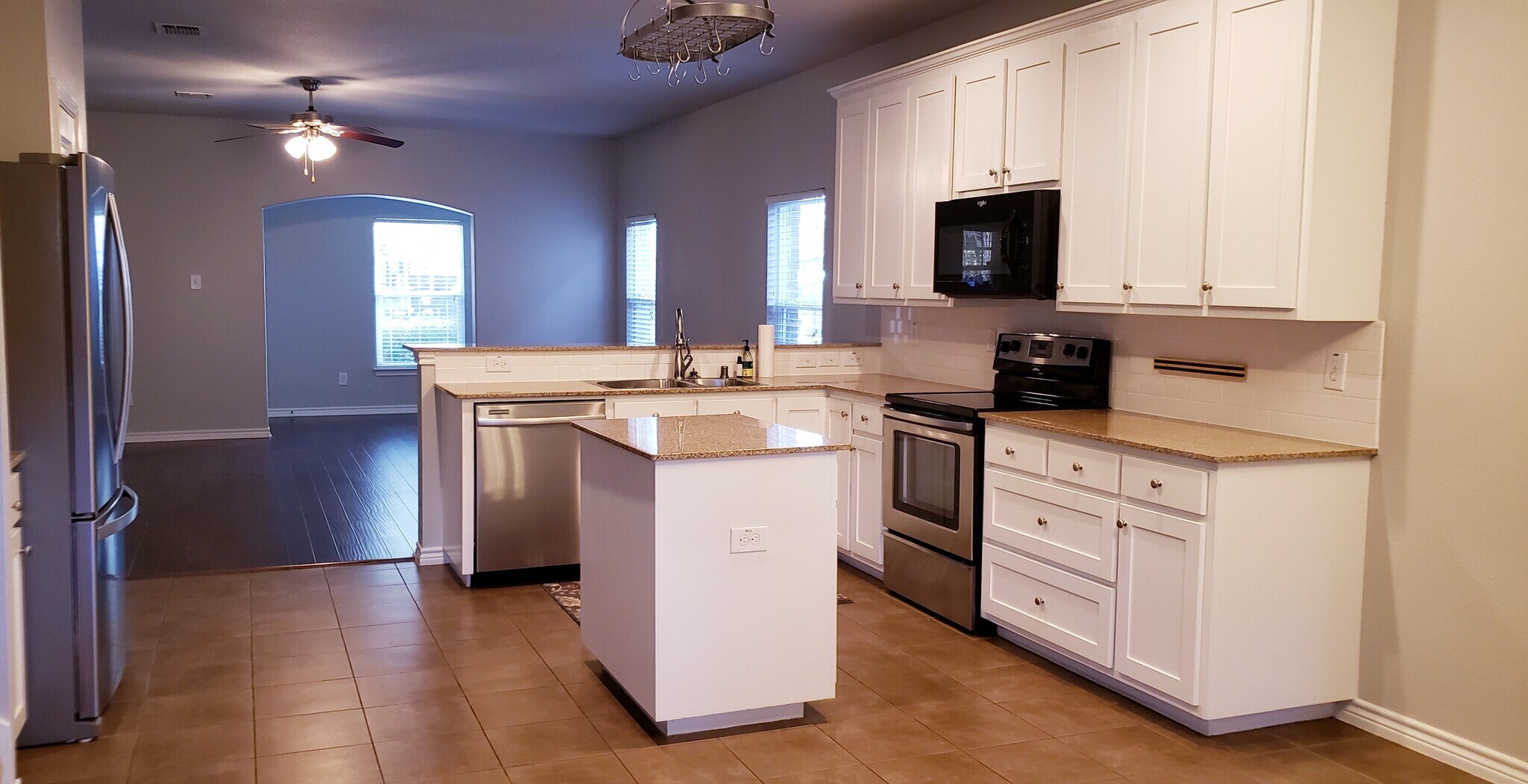 Kitchen w pot rack, walk-in pantry and built-in microwave - 3426 W 4th St