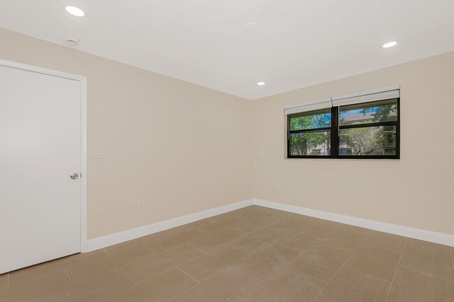 Building Photo - Fully Renovated Corner 1/1 “Villa” with Ba...