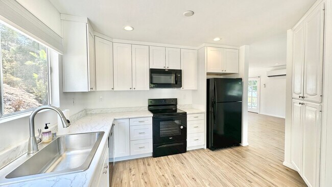 Building Photo - Nicely Updated Country Two-Story Home in t...