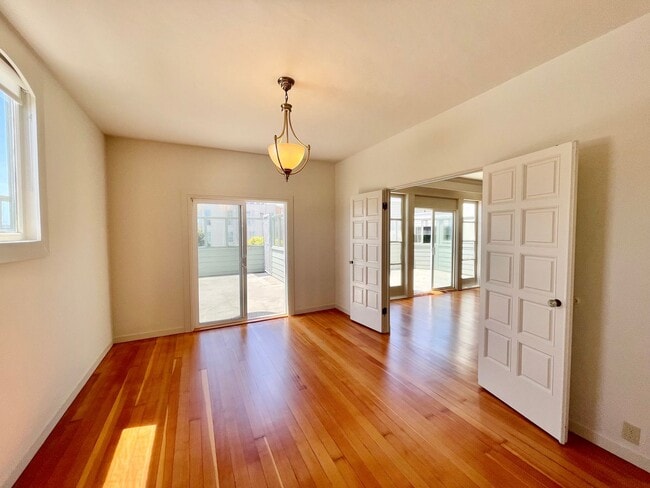 Building Photo - Bright and Airy 2 Bedroom Penthouse in the...