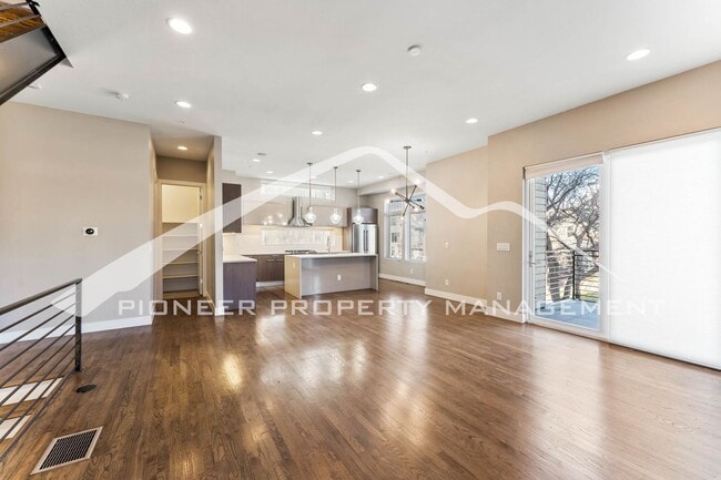 Building Photo - Fantastic Townhome with A Roof Top Patio, Attached Garage, and Central AC!