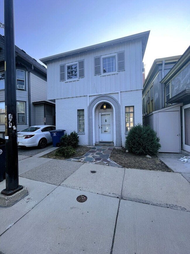 Building Photo - One Block to the Diag! Charming Home with Private Courtyard + Parking