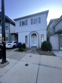 Building Photo - One Block to the Diag! Charming Home with Private Courtyard + Parking