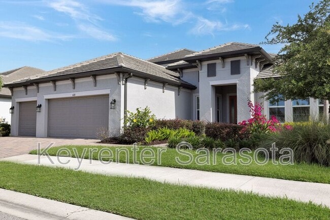 Building Photo - 6133 Lungo Lago Dr
