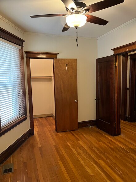 Bedroom and storage closets - 6110 S Evans Ave