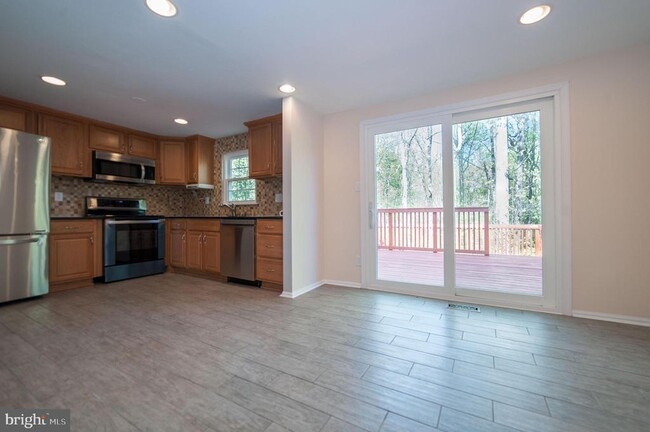 Building Photo - 5725 Walnut Wood Ln