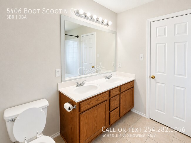 Building Photo - 5406 Boot Scootin Ct