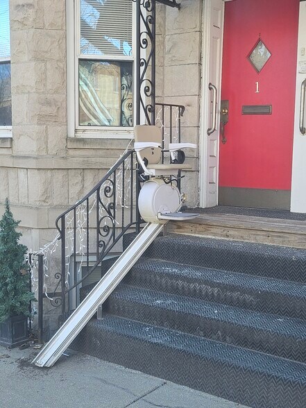 Front door & stair chair - 2974 S Loomis St