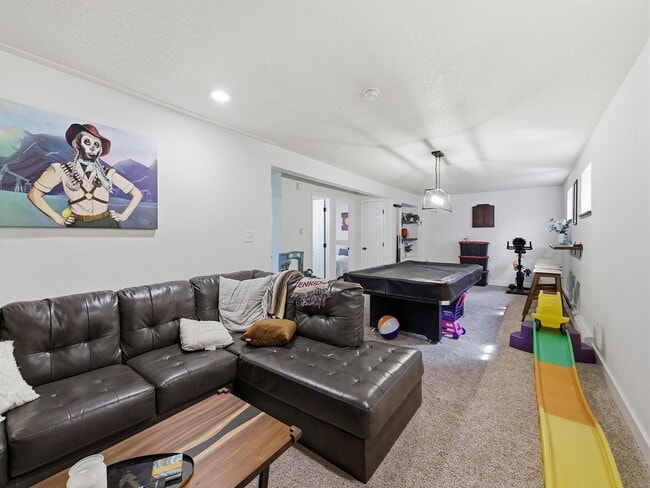 Building Photo - Bright Ranch Home with 2-Car Garage, Finished Basement, and Spacious Yard