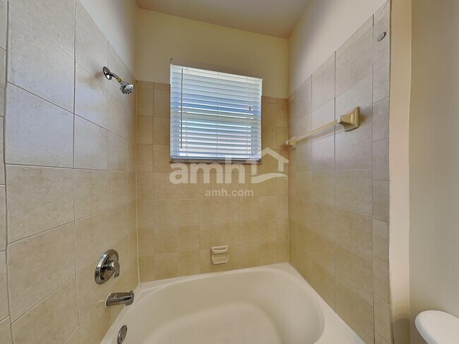 Building Photo - 6244 Macaw Glen