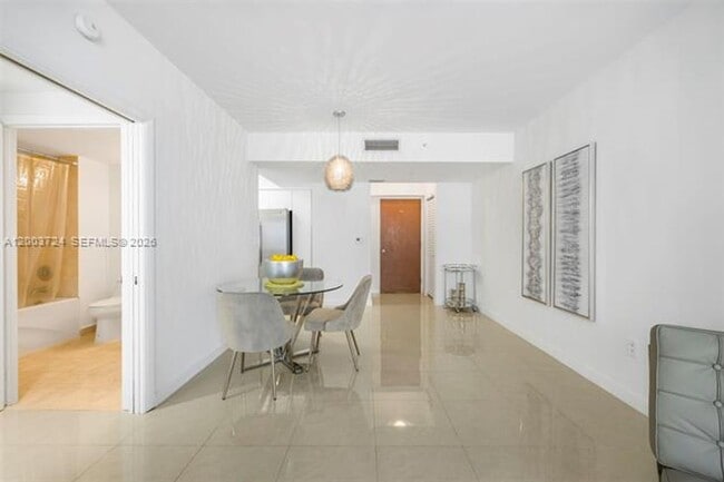 Building Photo - 6365 Collins Ave