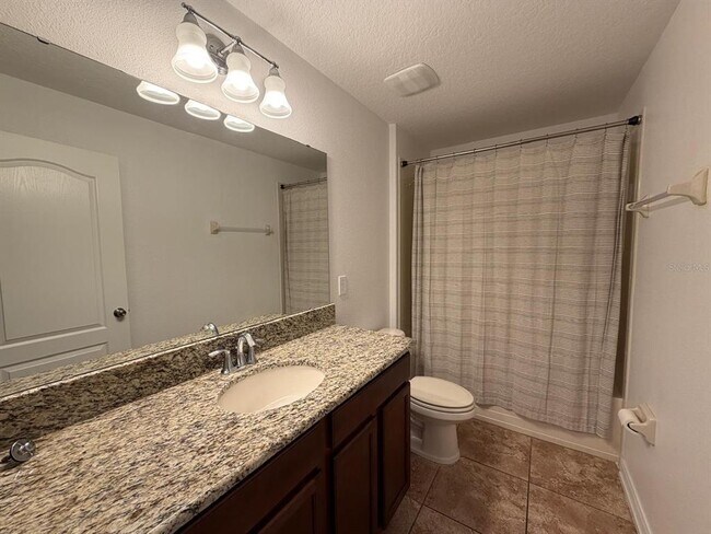 Building Photo - 5637 Water Rose Rd