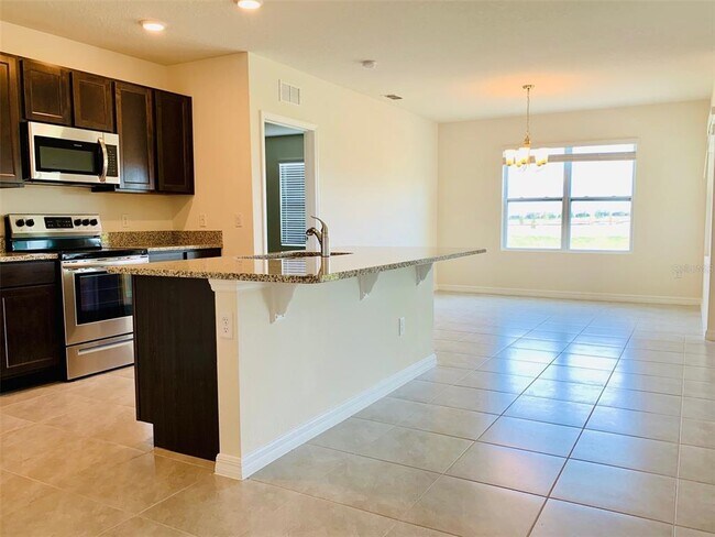 Building Photo - 9036 Tuscan Cypress St