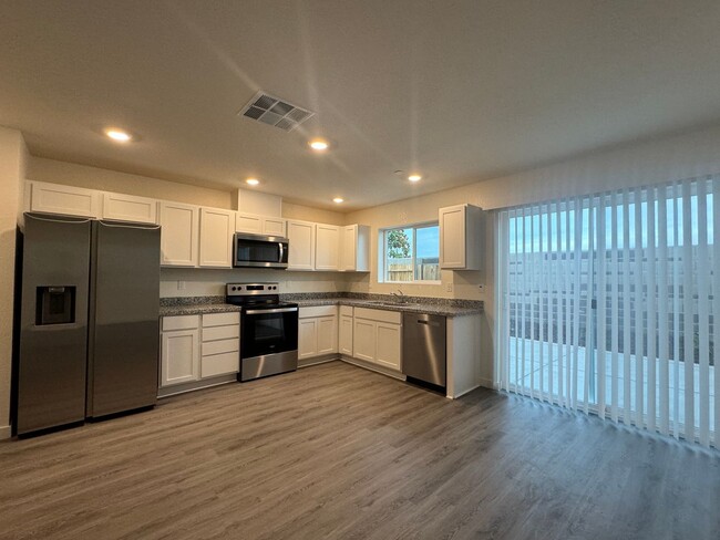 Building Photo - BRAND NEW 4 BEDROOM, 2.5 BATHS, 2 CAR GARA...