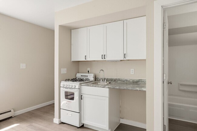 Building Photo - Freshly Remodeled Studio in the Heart of Waukesha!