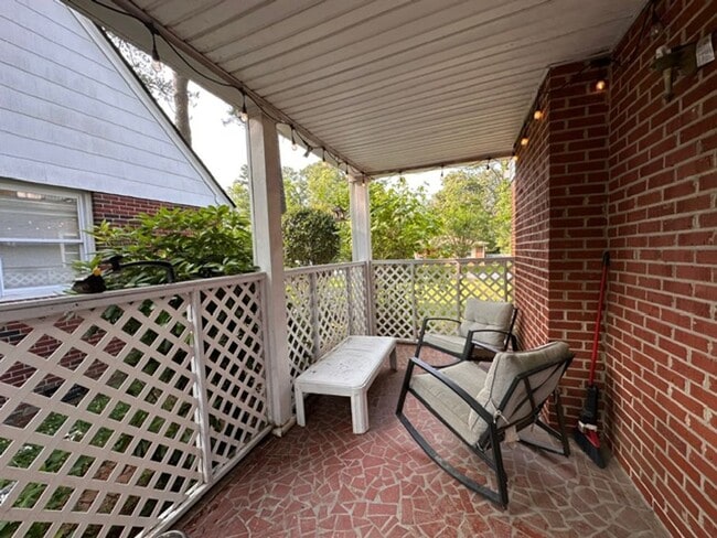 Building Photo - Charming Brick Cape Cope