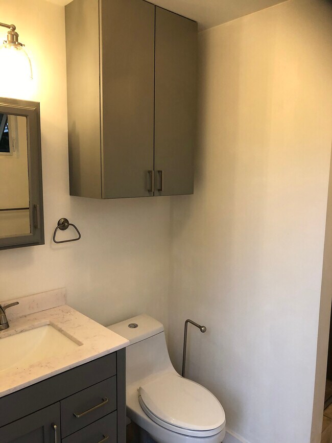 Bathroom storage - 4360 Stewart Ave