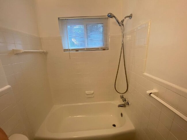 Building Photo - A spacious two bedroom, one and one half bath condo townhouse located in the northern section of ...