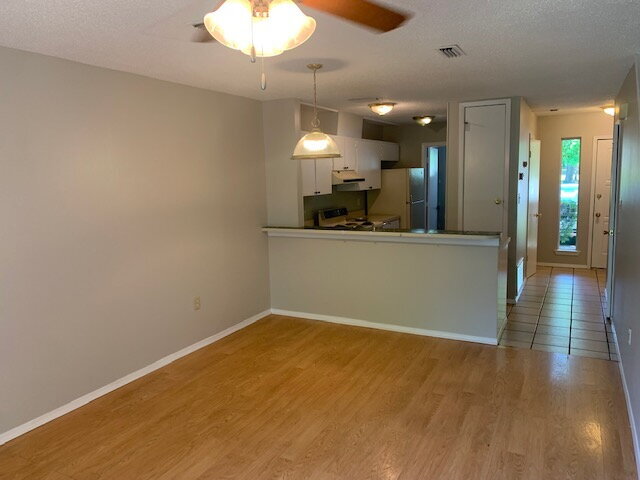 Building Photo - "Charming 2-Bed Townhouse Retreat in Fort ...
