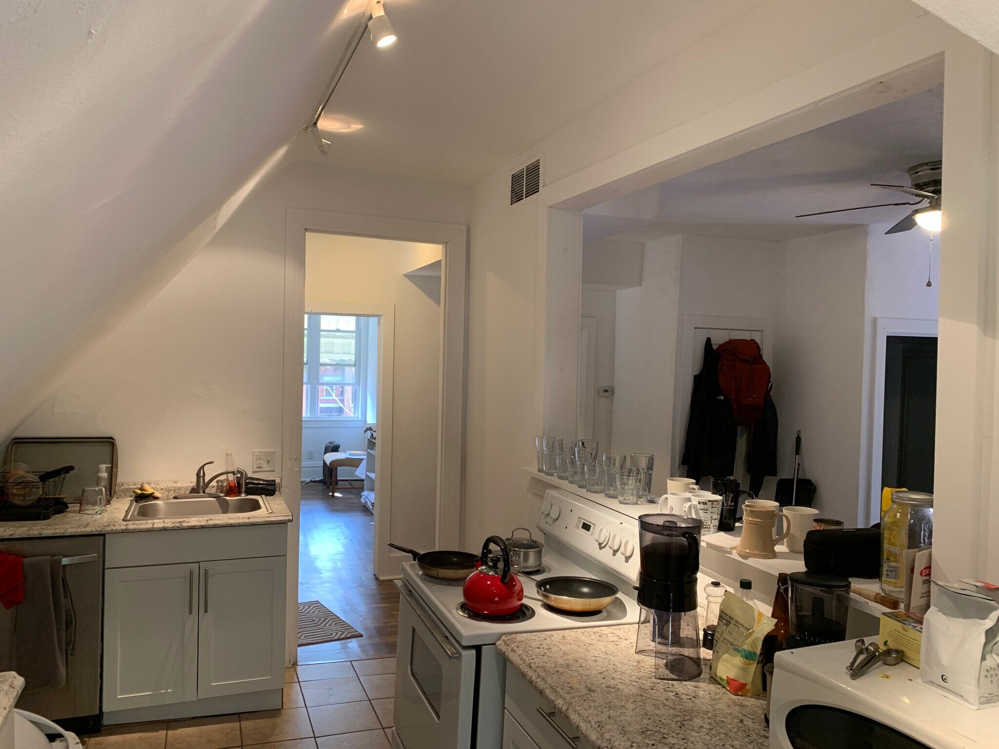 View from Kitchen into entry vestibule and living room - 351 Stratford Ave
