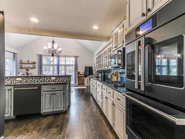 Building Photo - This stunning 4-bedroom, 3.5-bathroom home...