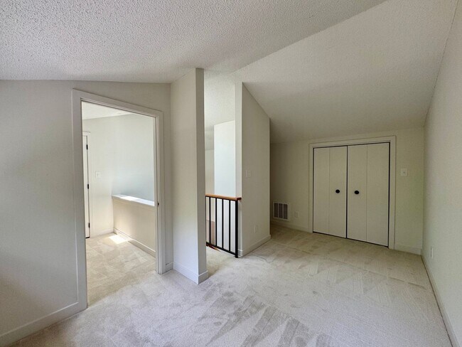 Building Photo - Spacious 2-Story Falconbridge Condo with Private Courtyard and Resort-Style Amenities