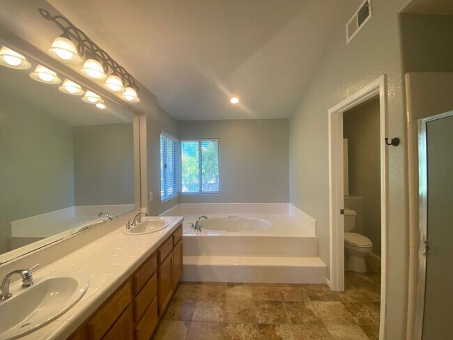 Building Photo - Stunning 4 bedroom Home with a Pool locate...