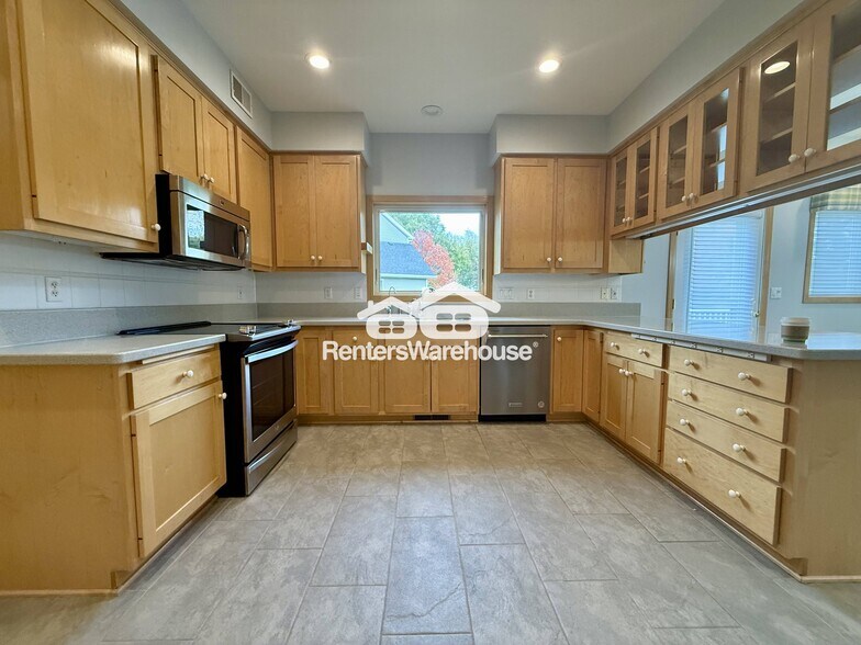 Building Photo - 9536 Windflower Pl N