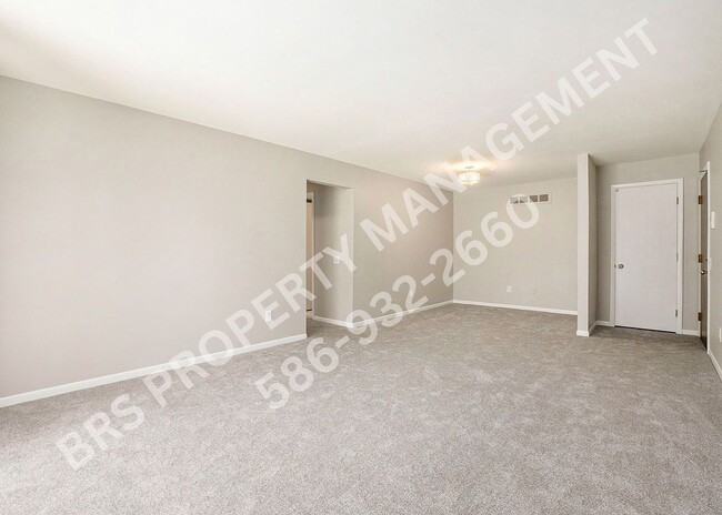 Building Photo - Charming 2-Bedroom Condo in Clinton Twp. –...