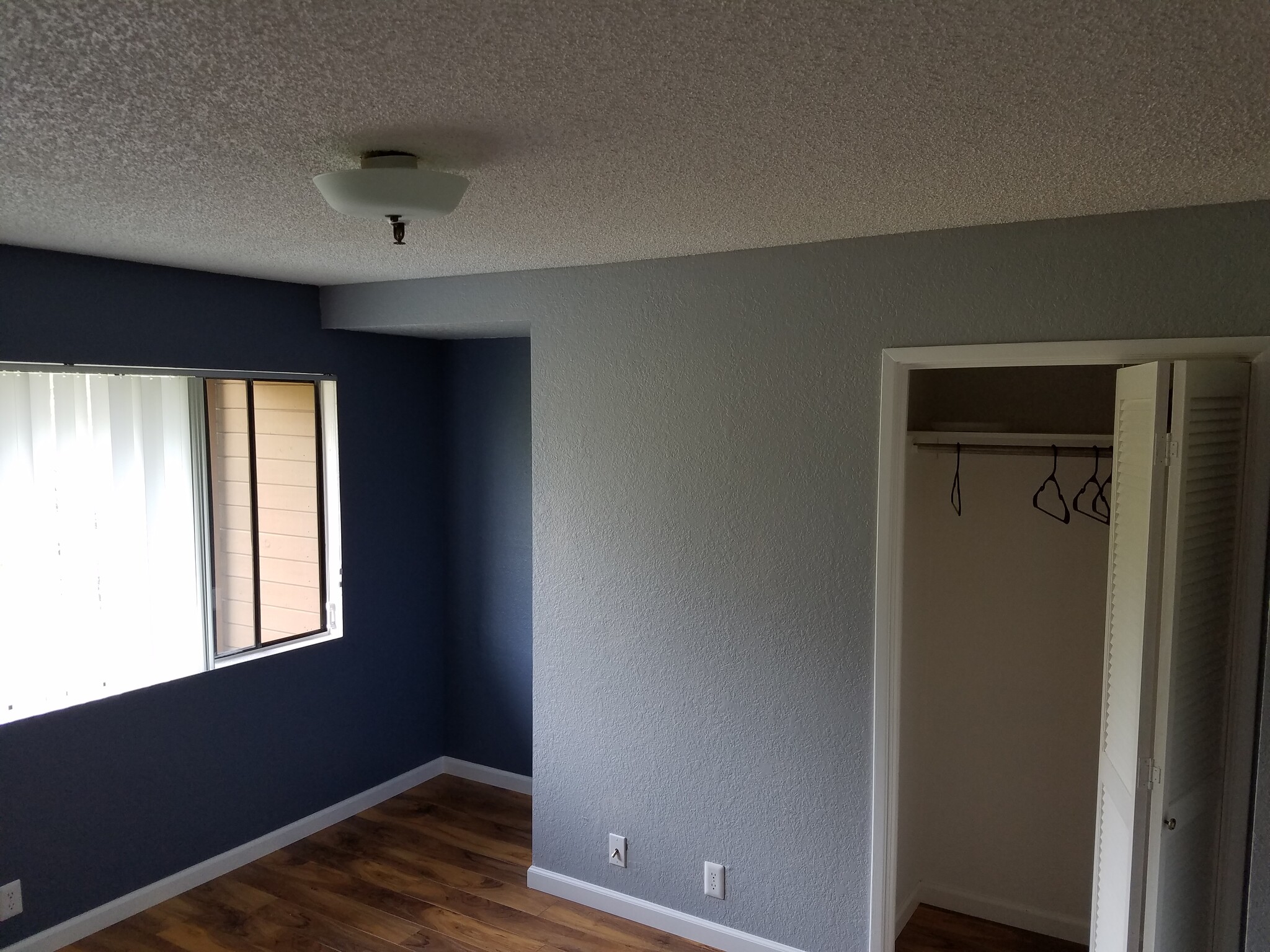 Bedroom with large windows. - 45 Stenner Street